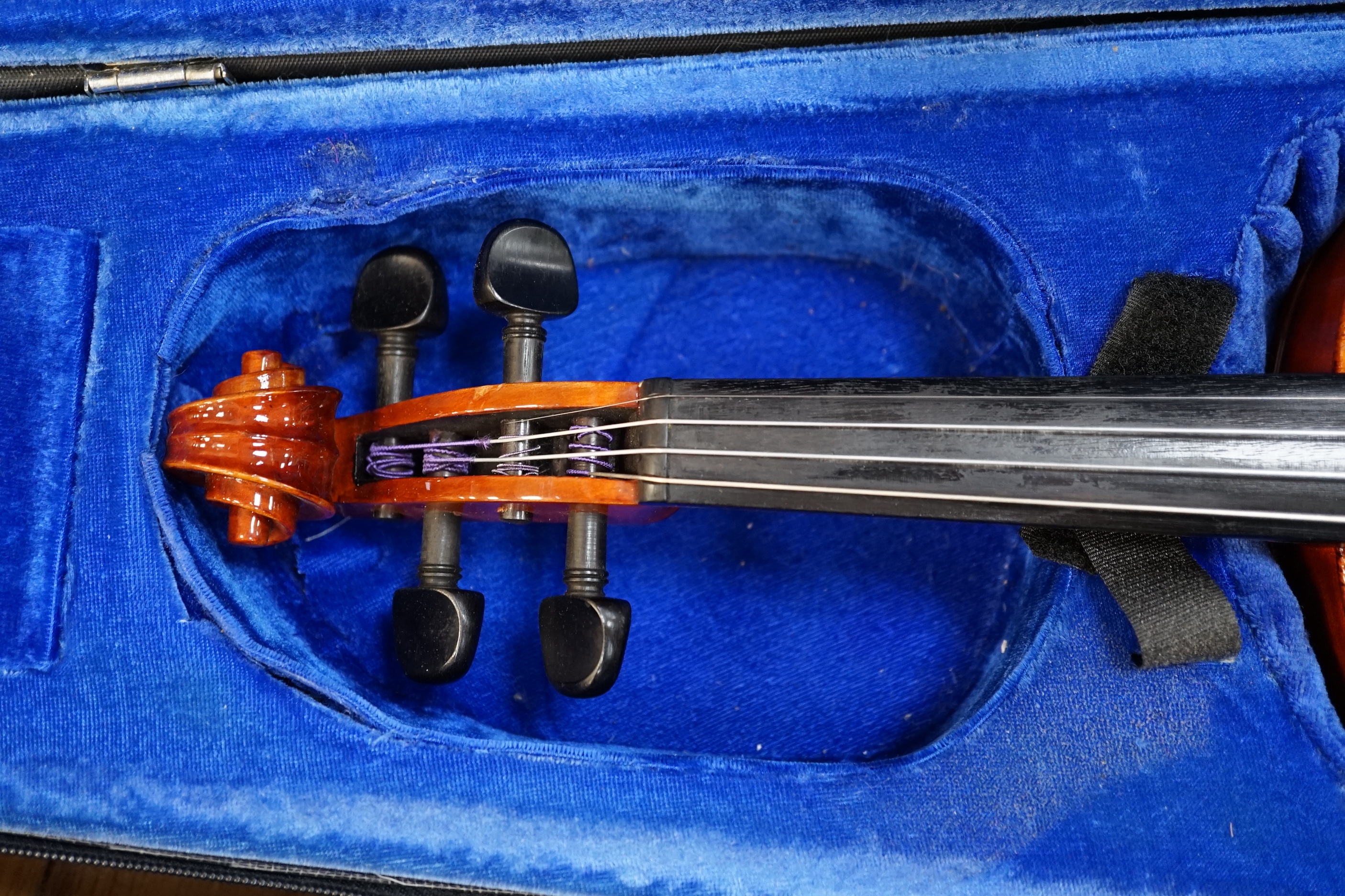 A 19th century English violin, bears hand written paper label, a modern Stentor violin and a metronome